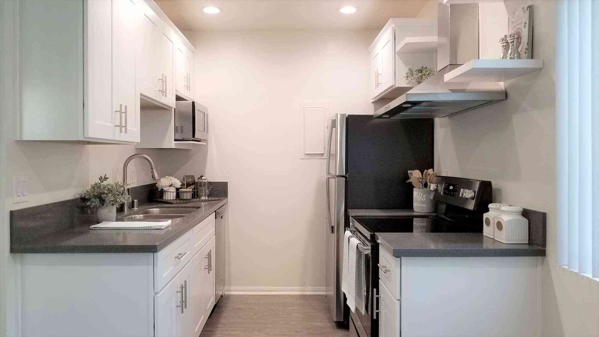 galley kitchen layout with quartz countertops