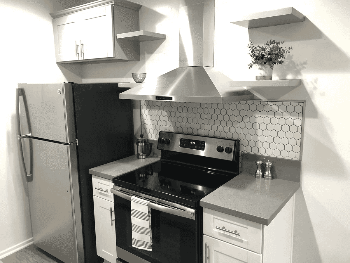 modern stove and stainless steel range hood