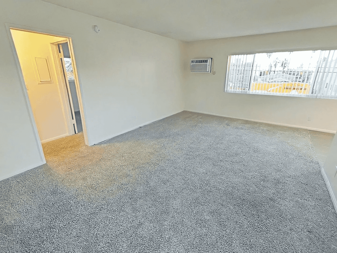 open floor plan living and dining space
