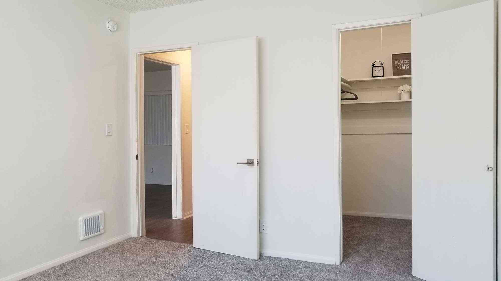 bedroom entryway and walk in closet